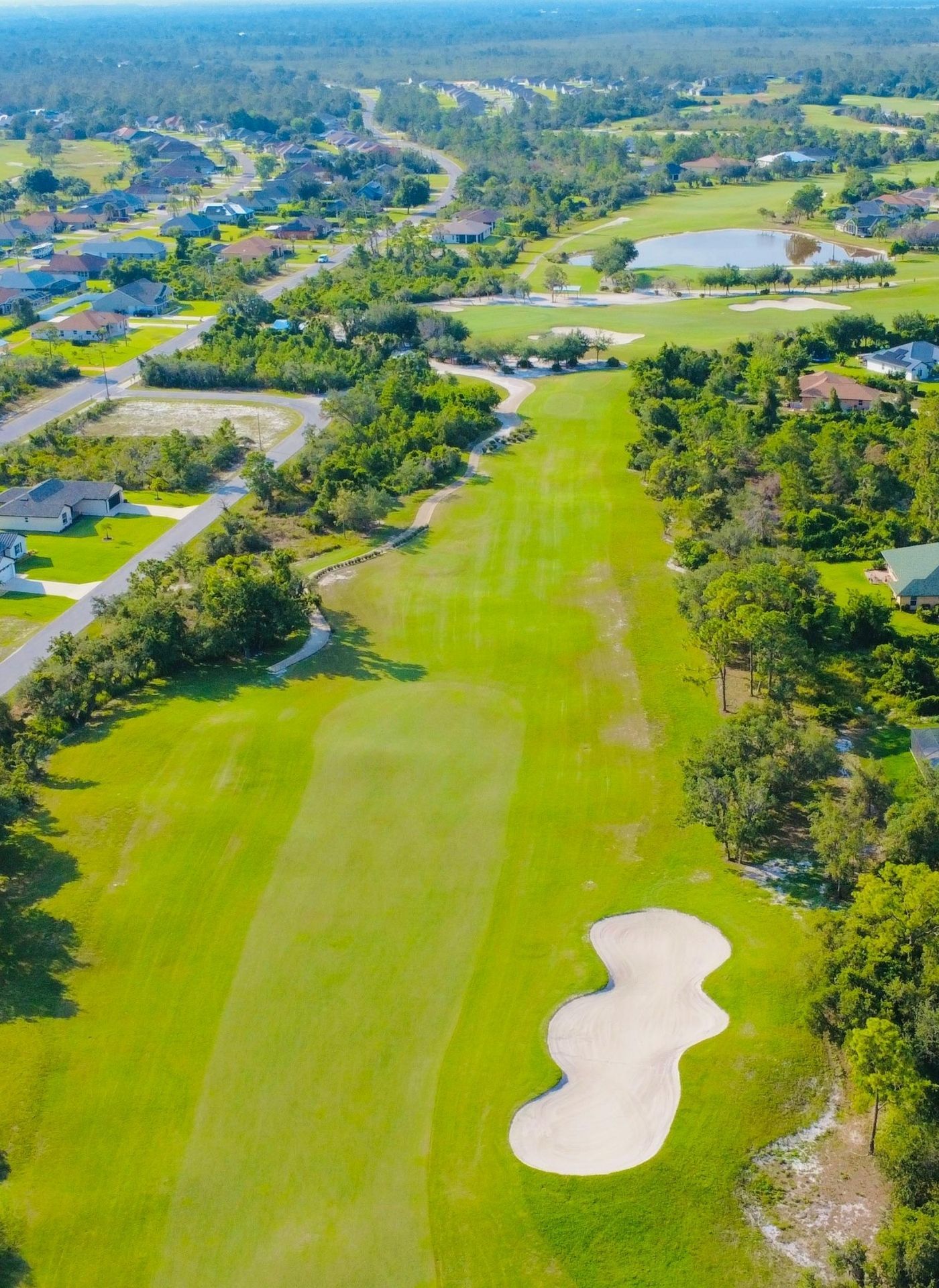 The front of a black cadillac escalade is shown on a white background.
