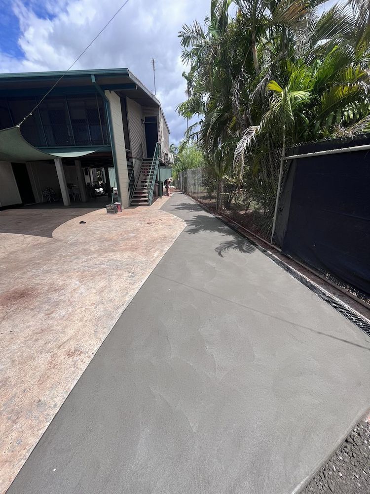 Concrete Driveway Leading to a Two-story Building and Gated Entry — Mobcon Construction in Berry Springs, NT