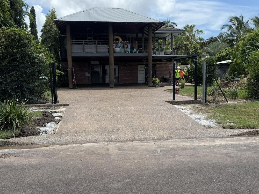 Two-story House With Exposed Aggregate Driveway — Mobcon Construction in Berry Springs, NT