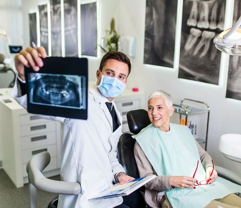 Dentist Checking The Dental X-ray Of His Patient — West Des Moines, IA — Westbrooke Family Dentistry