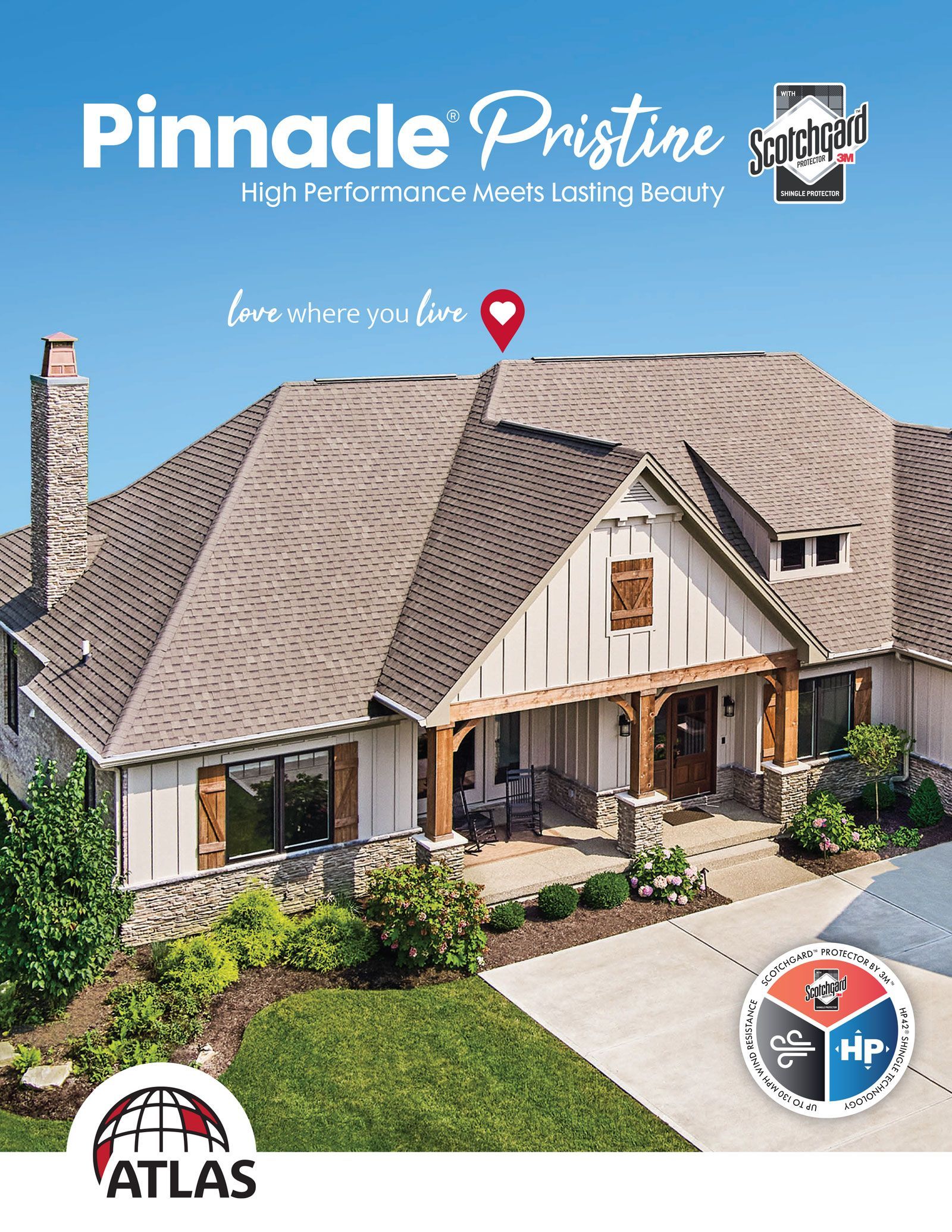 A large house with a roof that is covered in shingles.