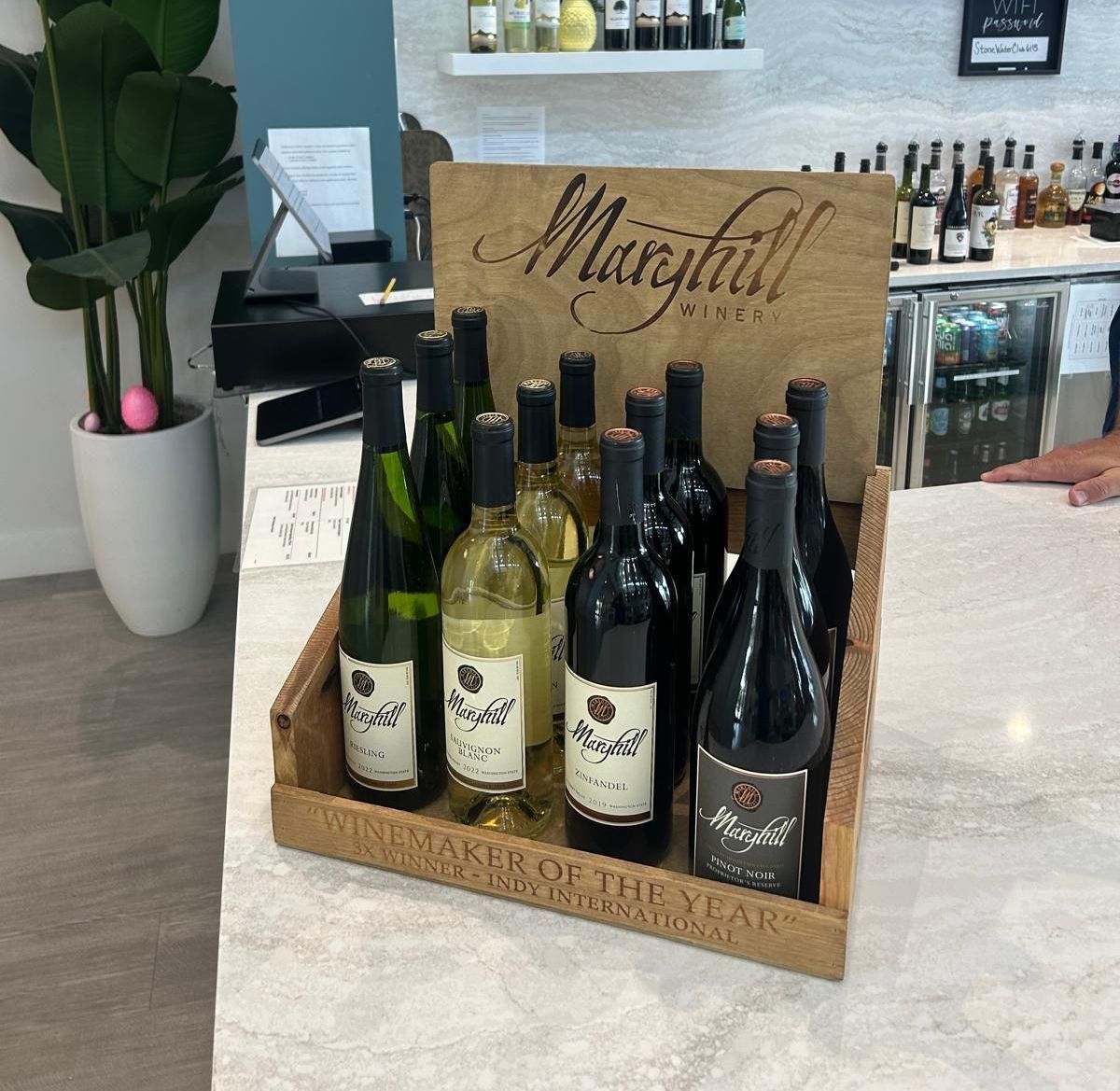A wooden box filled with bottles of maryhill wine