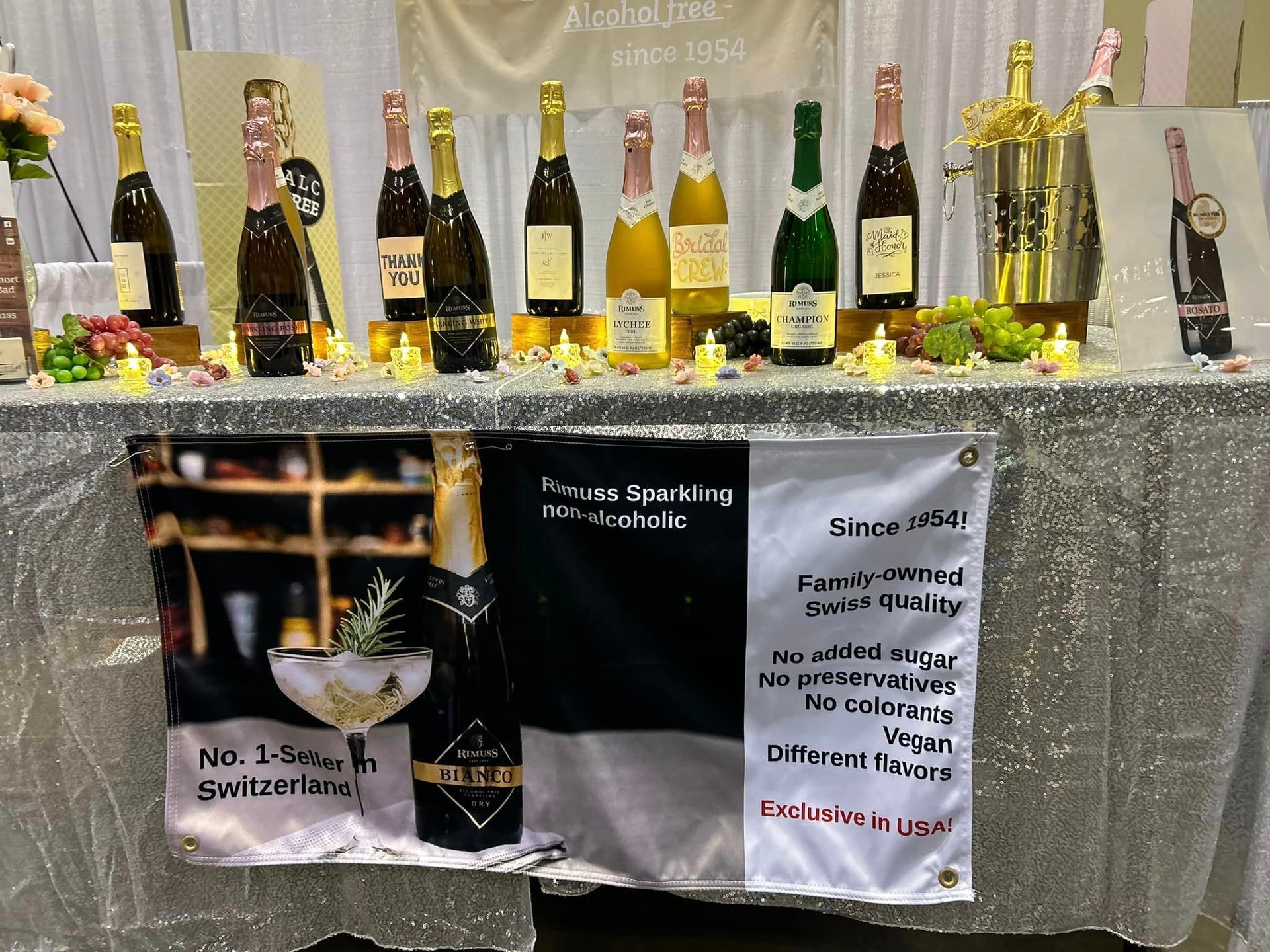 A table with many bottles of champagne on it