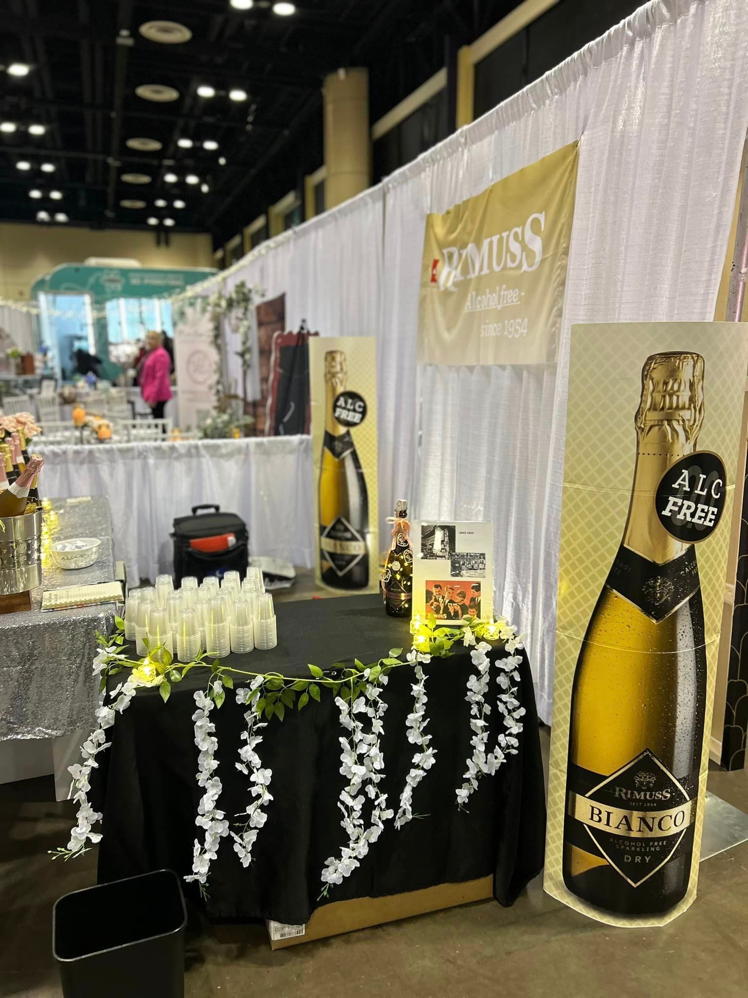A table with a bottle of champagne on it in a room.