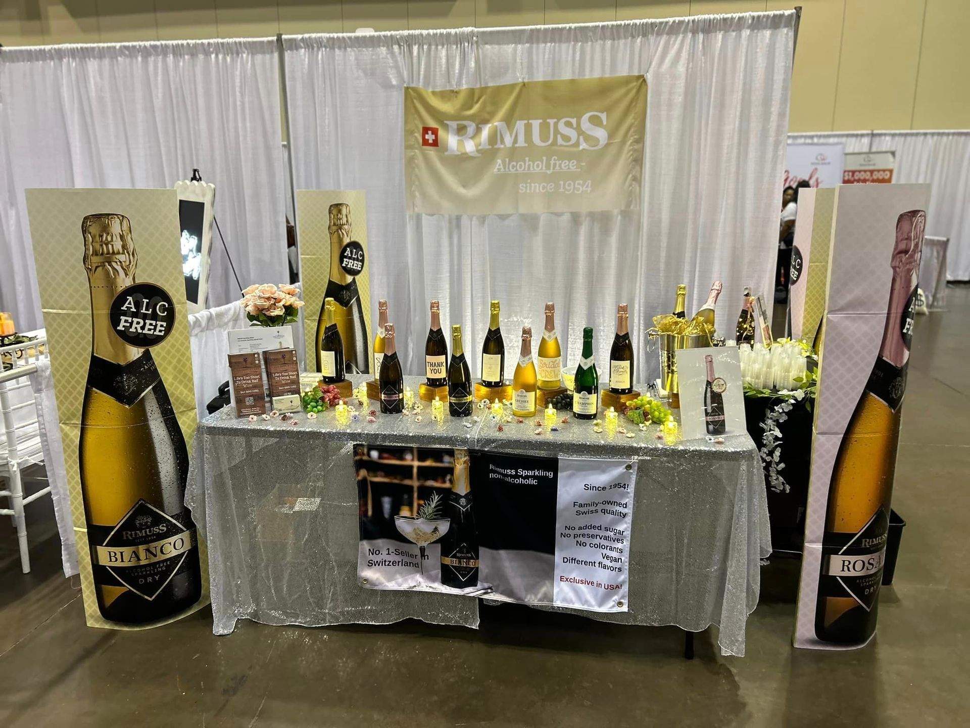 A table with a lot of bottles of champagne on it