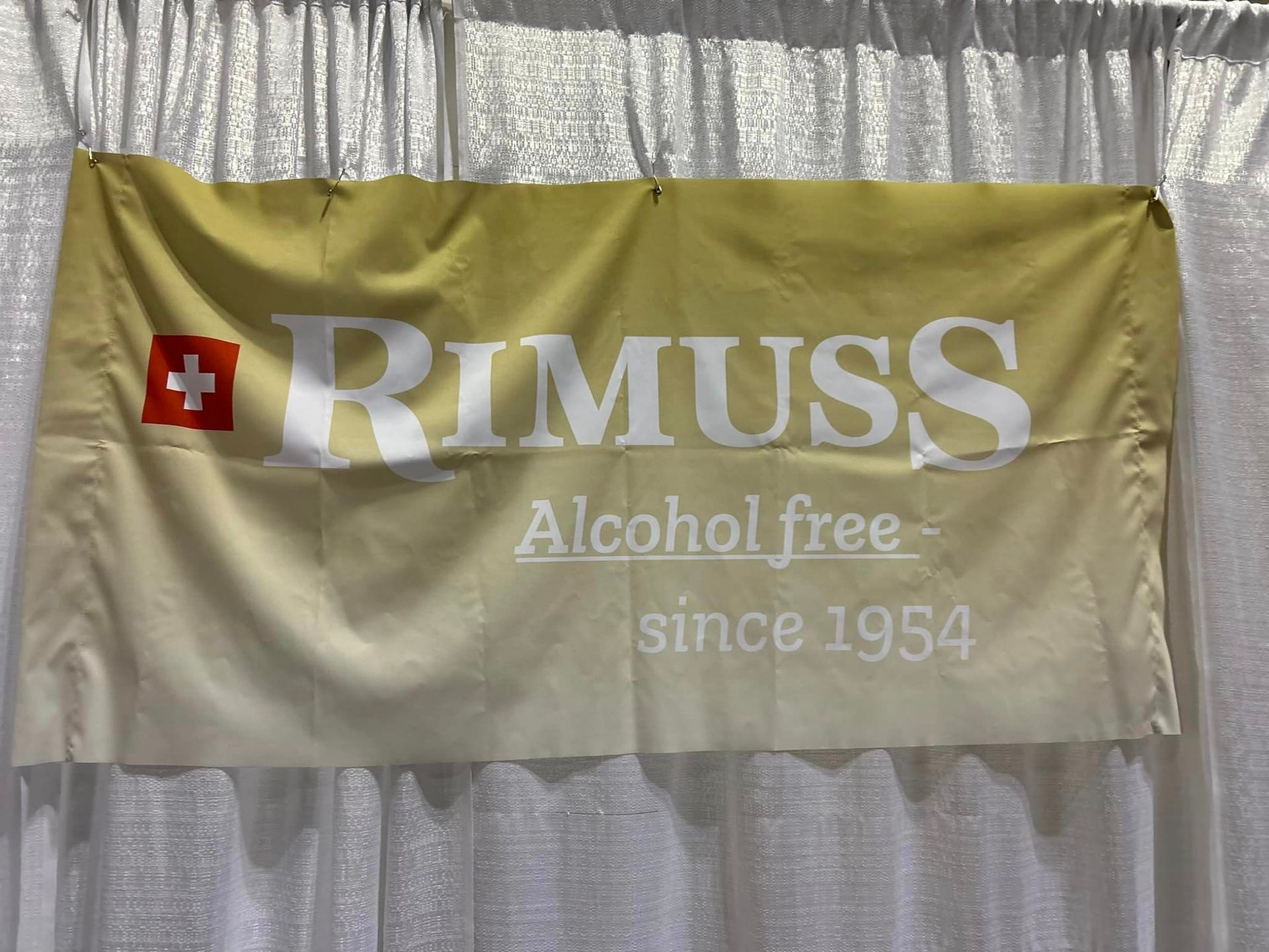 A banner that says rimuss alcohol free since 1954