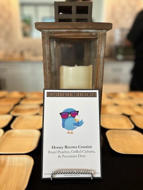 A wooden lantern with a candle inside of it