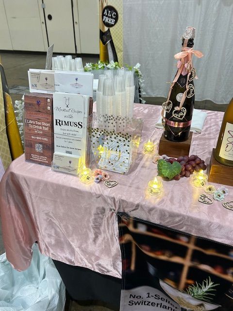 A table with a bottle of rum on it