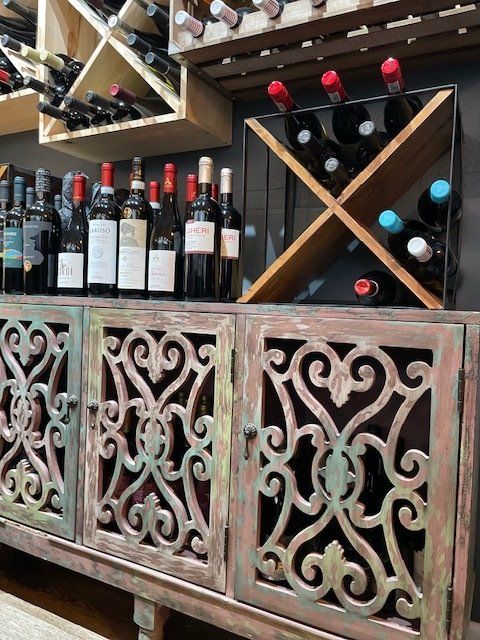 A wine rack with bottles of wine on it