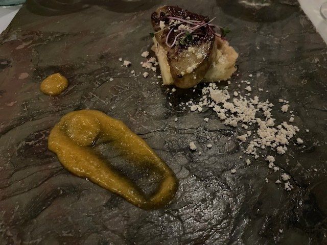 A close up of a plate of food on a table.