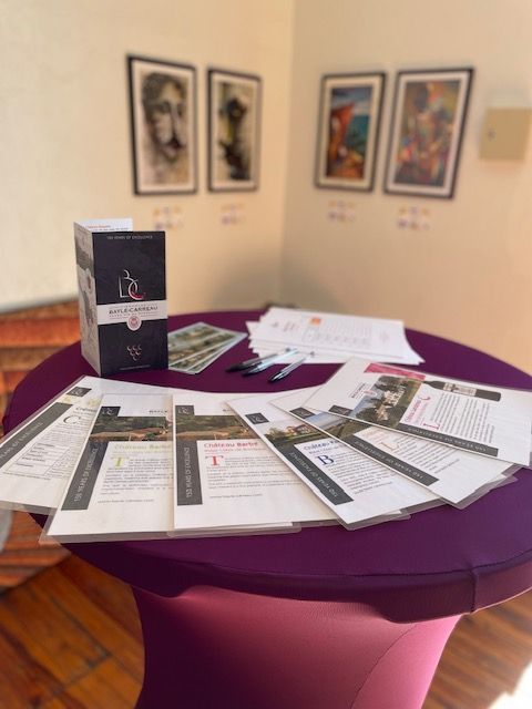 A purple table with a box that says ' i2 ' on it