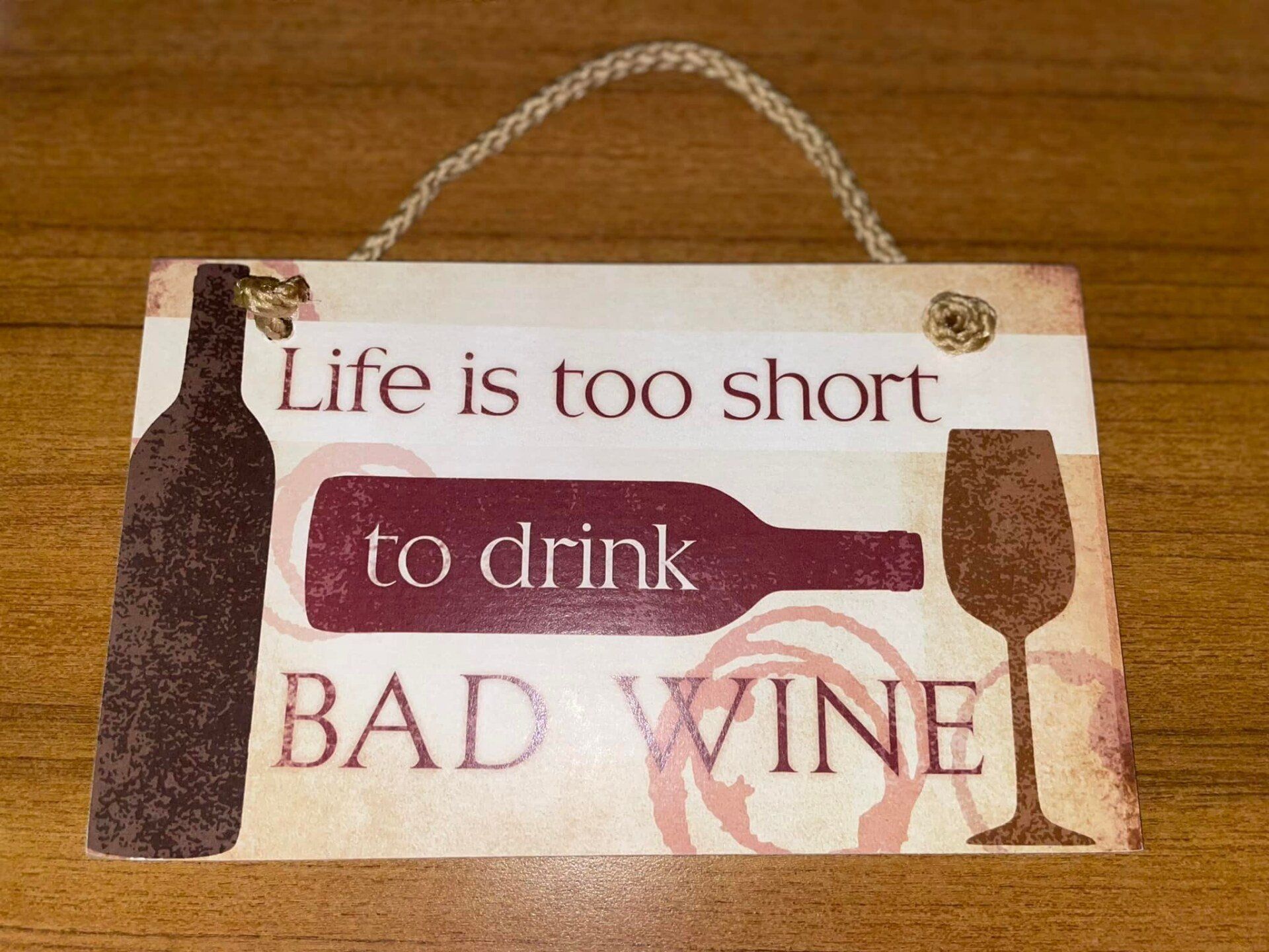 A sign that says life is too short to drink bad wine