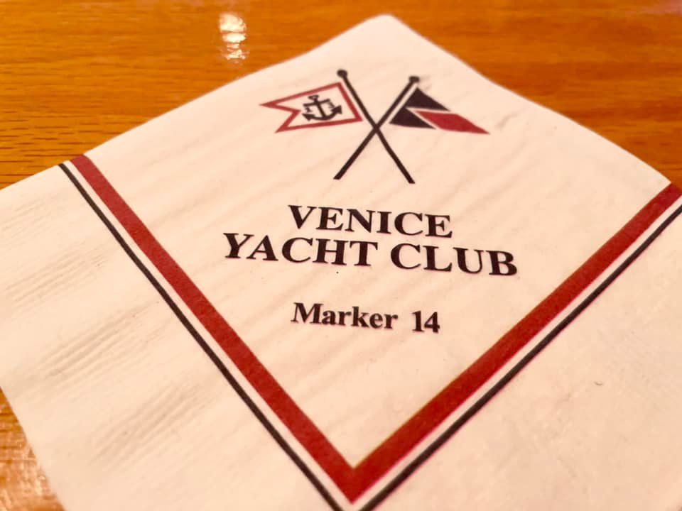 A napkin that says venice yacht club marker 14