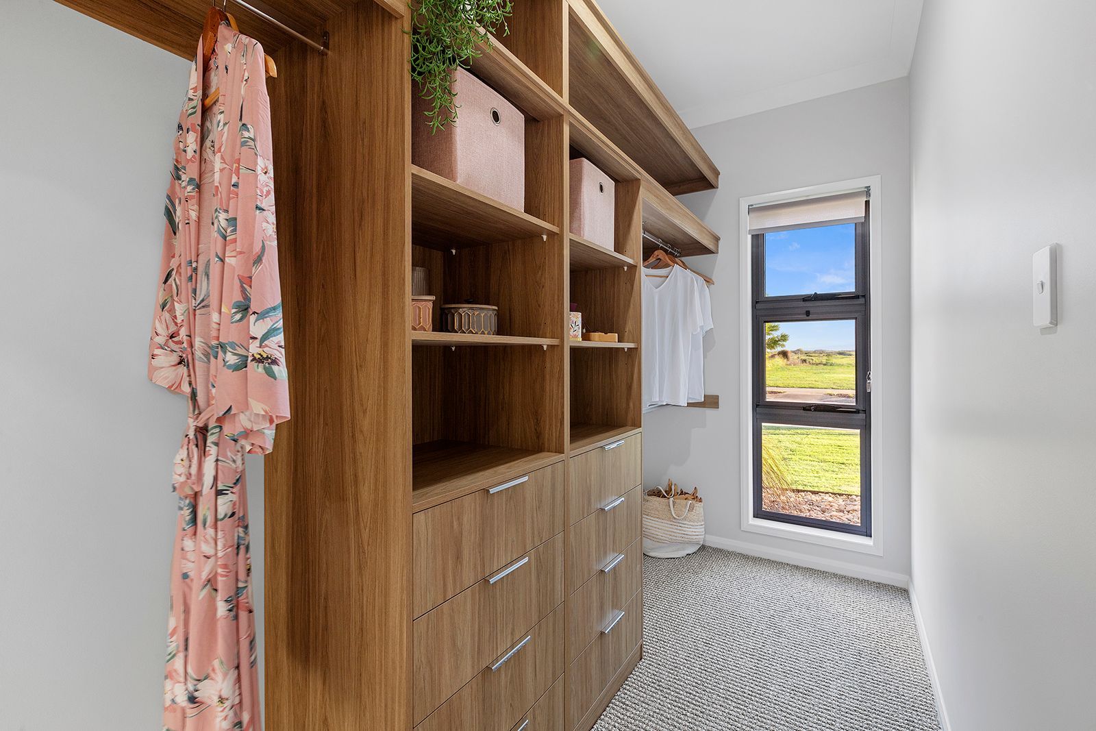 Bedroom With A Large Wooden Wardrobe And Shelves — City Cabinetmakers in Mackay, QLD