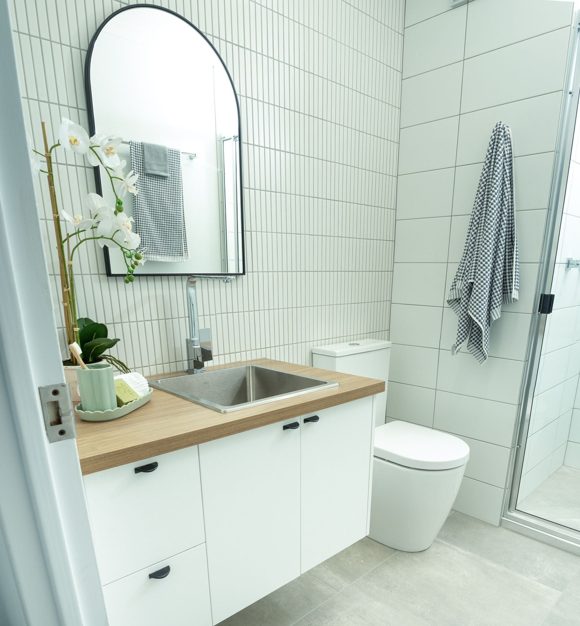Bathroom With Two Sinks And A Large Mirror — City Cabinetmakers in Mackay, QLD