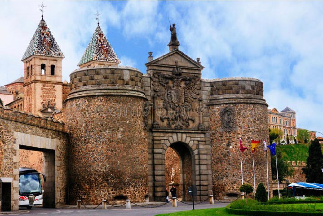 A large stone building with a tower on top of it.