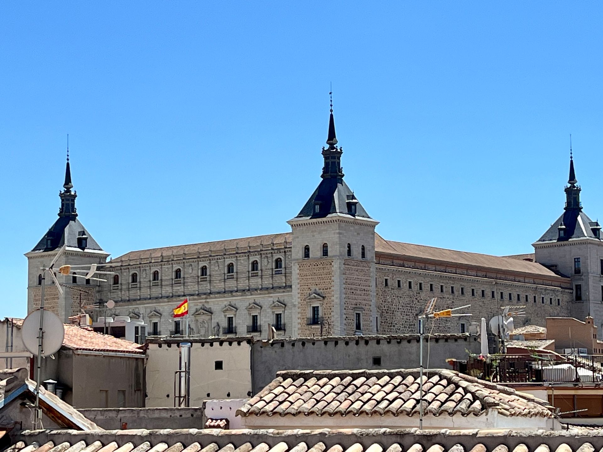 A large building with a blue sky in the background