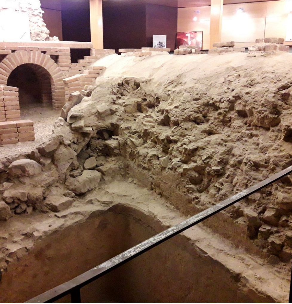 A large pile of dirt and rocks in a room