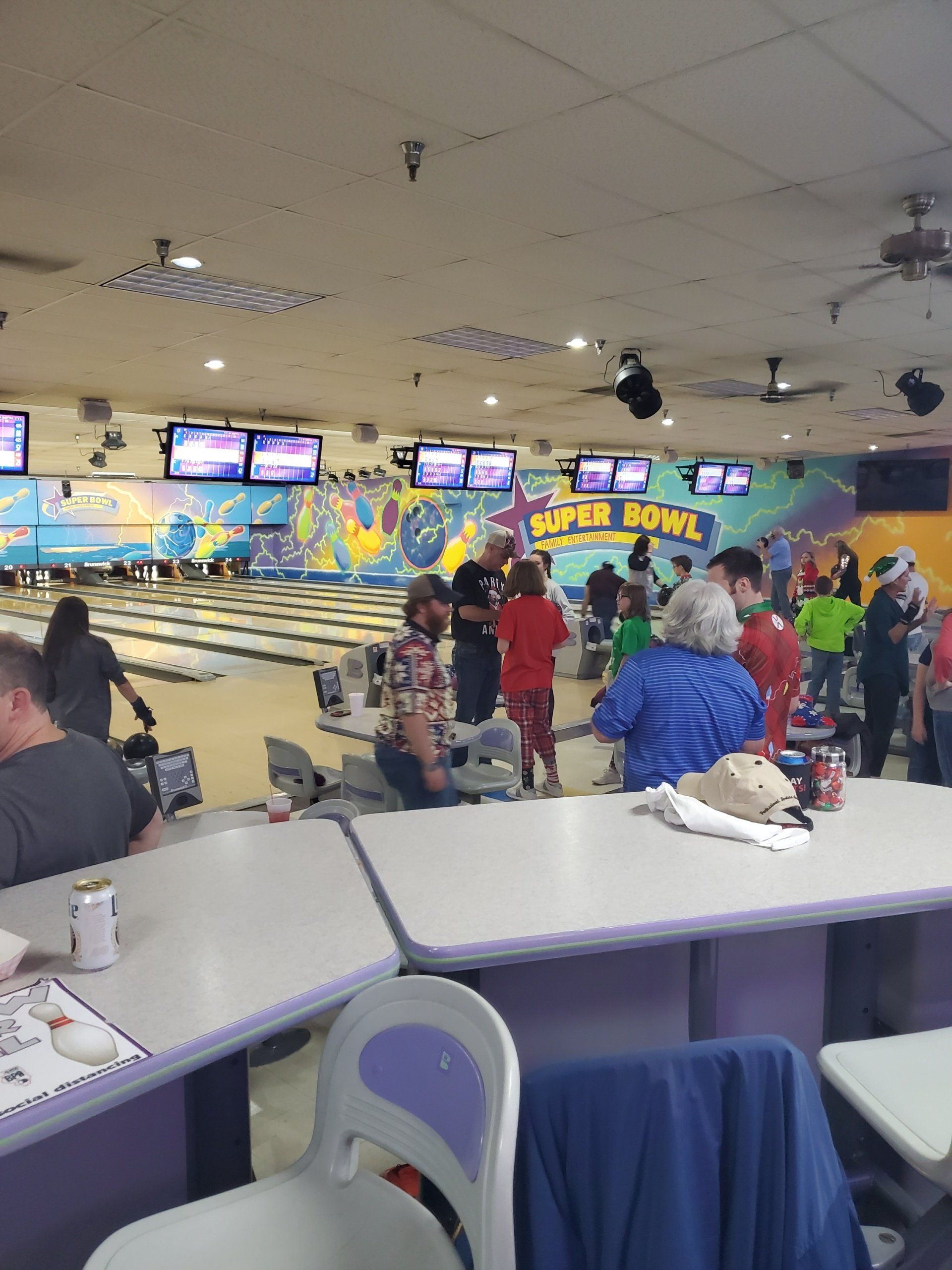 A bowling alley with a sign that says super bowl