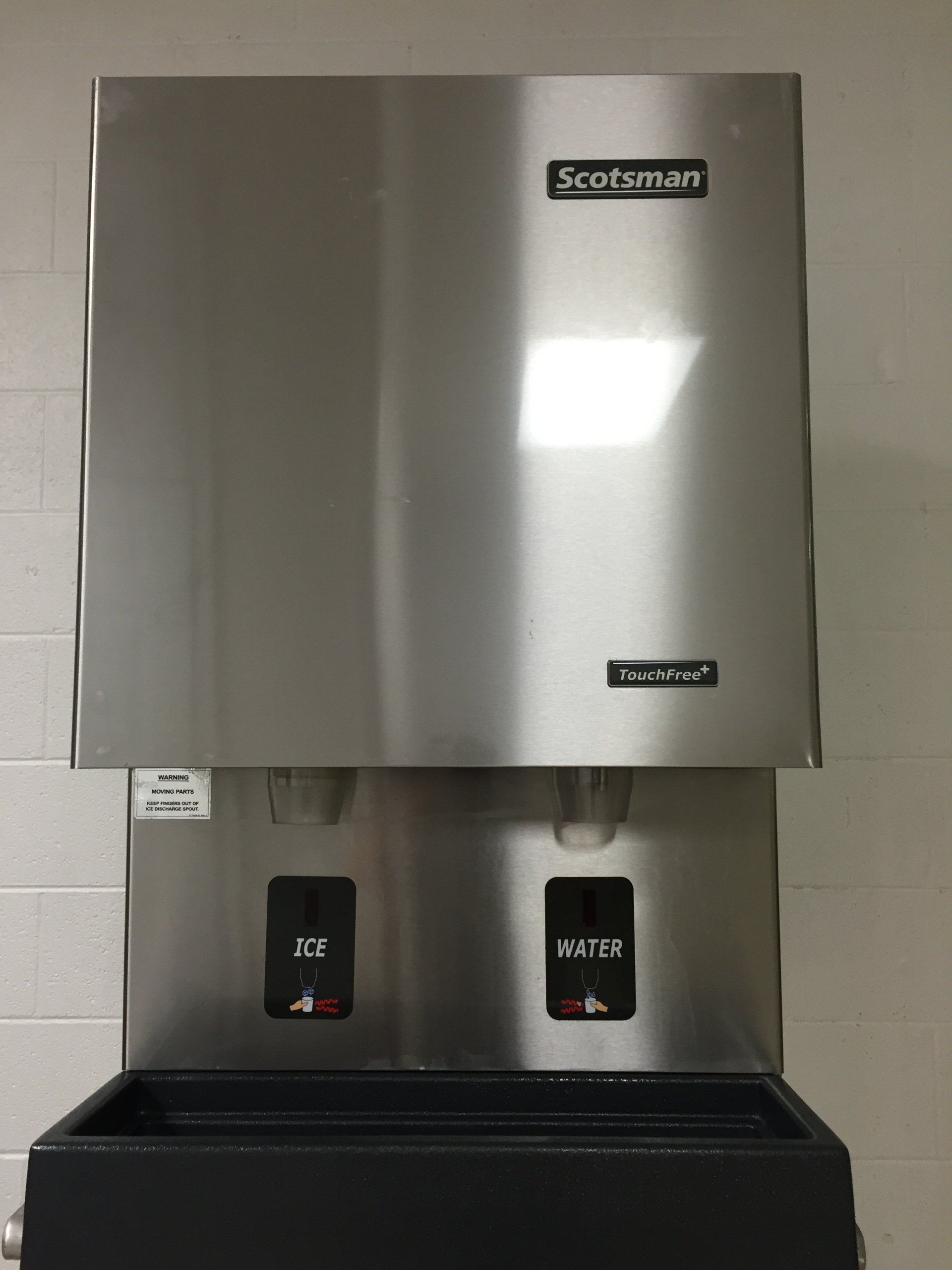 A stainless steel wall mounted scotsman ice and water dispenser