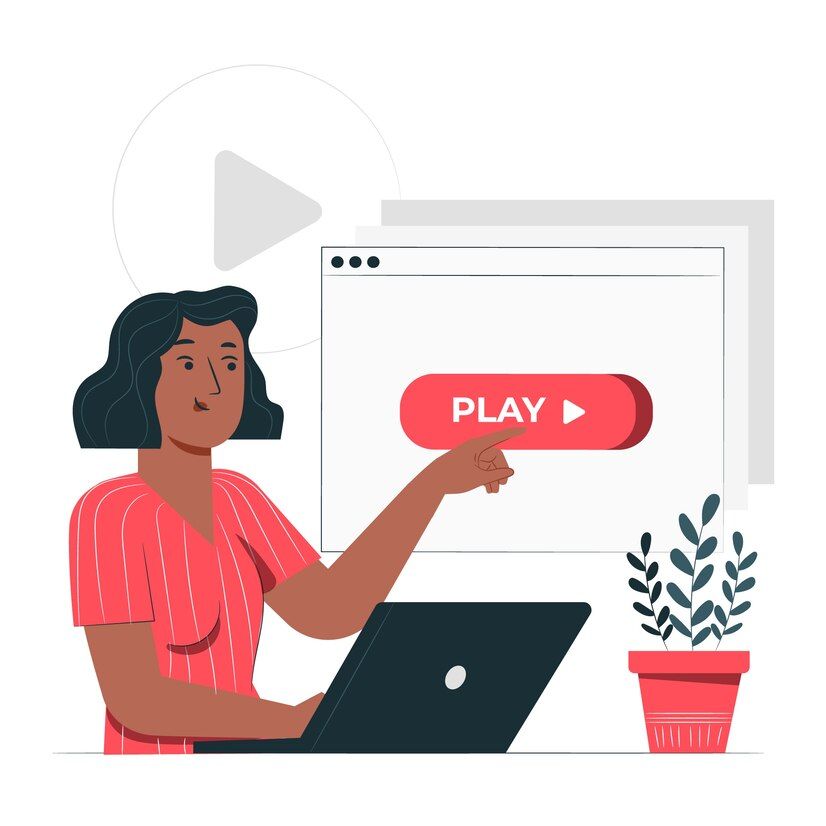 Una mujer estå sentada frente a una computadora portåtil y señala un botón de reproducción.