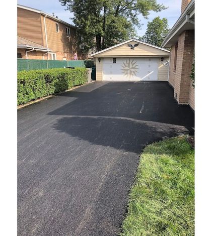 Bulldozer - commercial asphalt sealcoating in Oak Lawn, IL