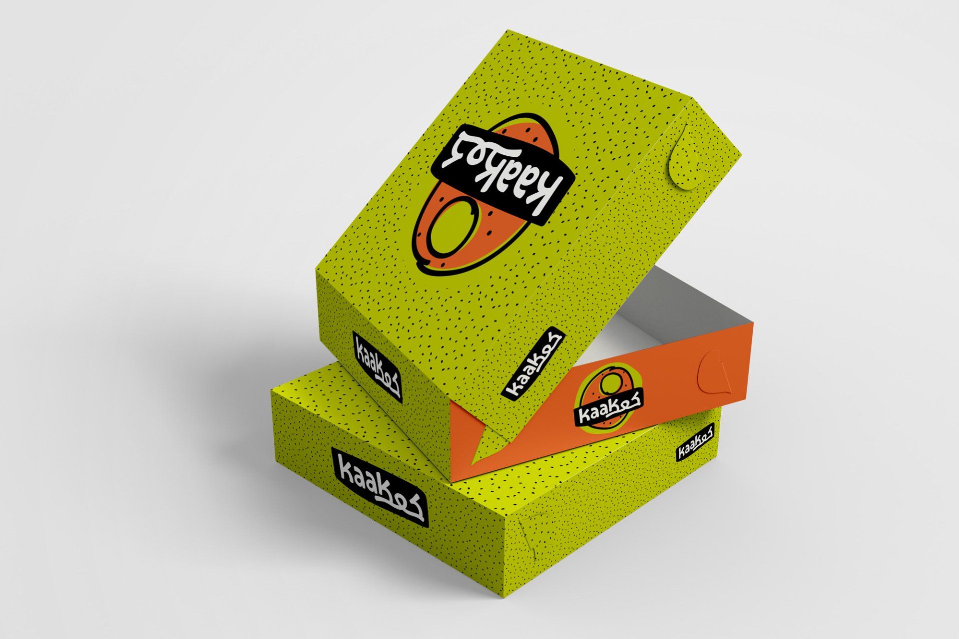 Three stacked food boxes, lime green with orange accents and speckled texture. Boxes have 