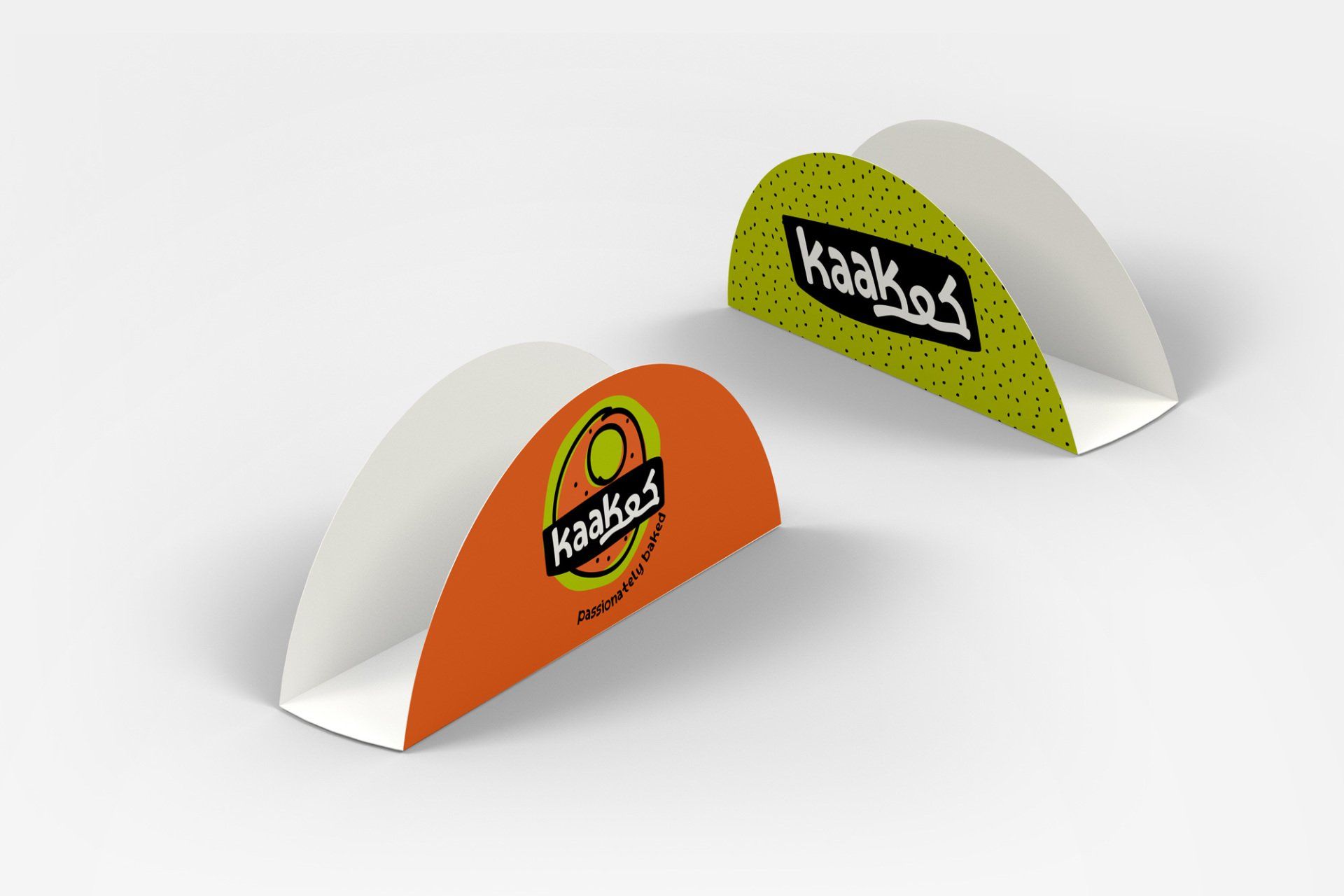 Two branded napkin holders, orange and green, with the 