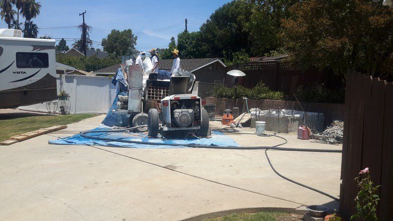 A progression of a jacuzzi and pool being completed