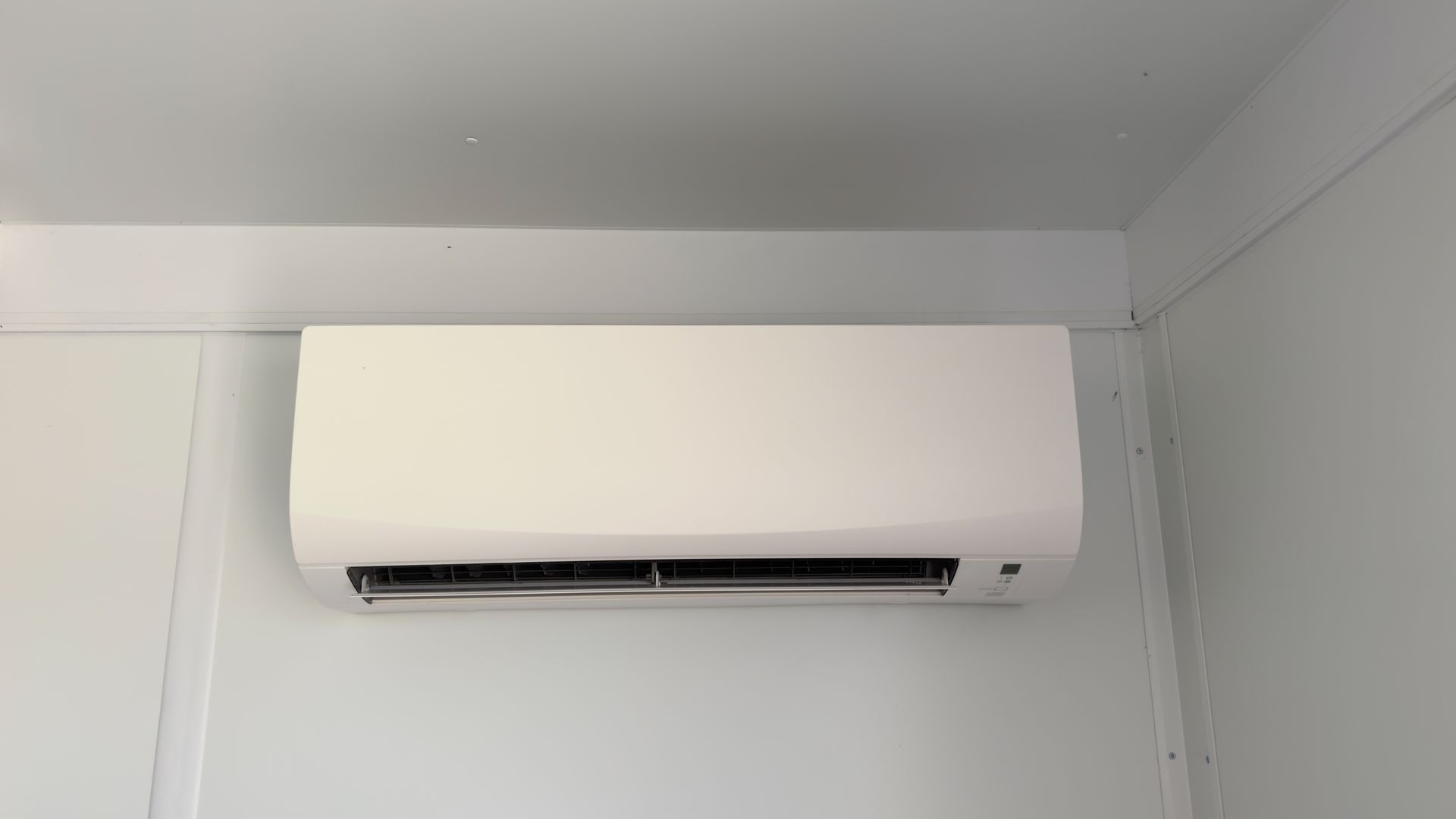 White wall-mounted air conditioner.