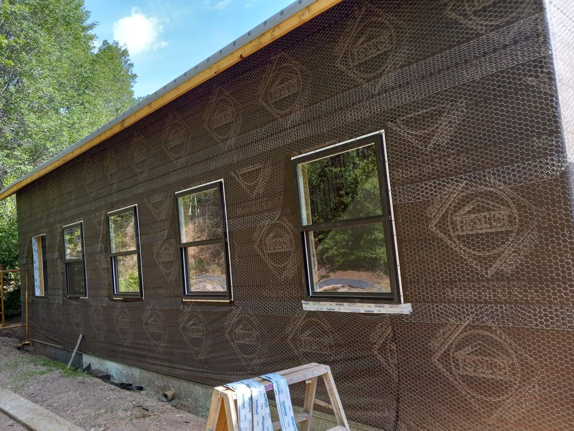 Exterior stucco installation and wall finishing on Los Alamos NM home