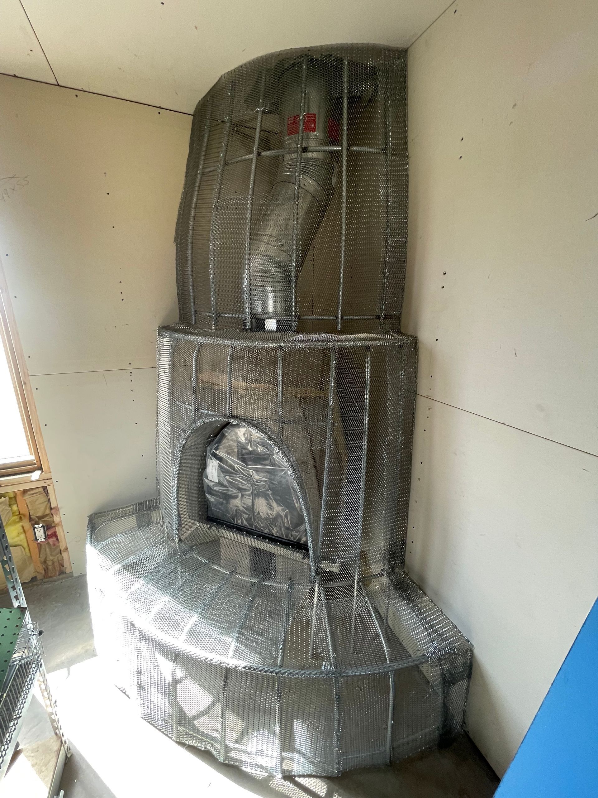 Kiva fireplace kit installation in Santa Fe NM home remodel by Santa Fe R&R