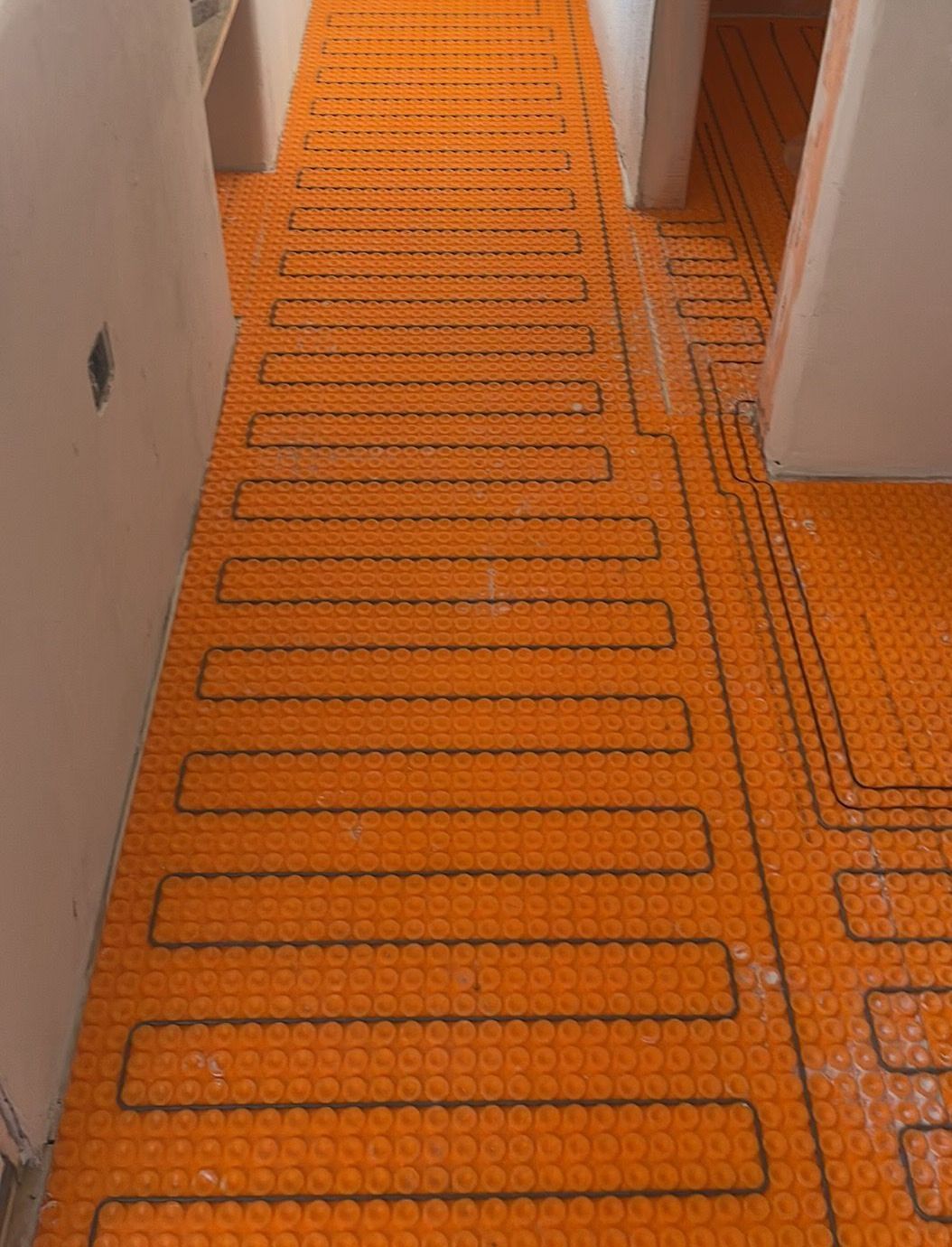 Radiant heat flooring system installed in bathroom remodel in Santa Fe NM