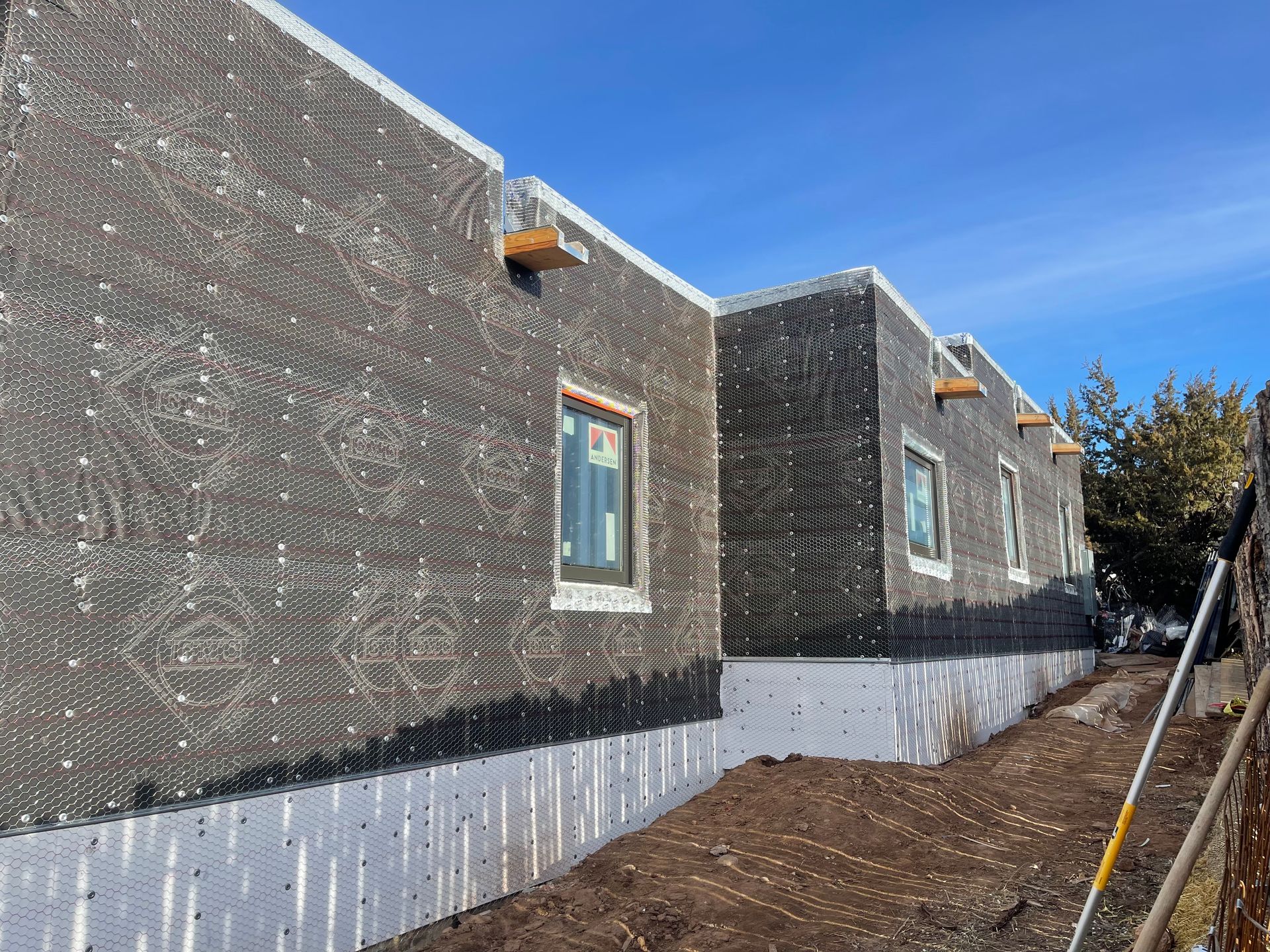 Stucco lath and waterproofing installation phase for home exterior in Santa Fe NM