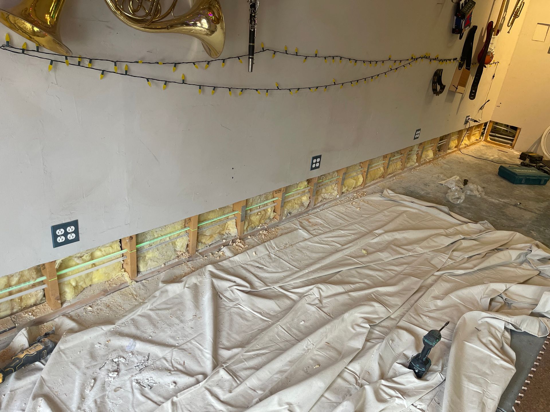 Interior remodeling project in progress with protective coverings in Santa Fe NM