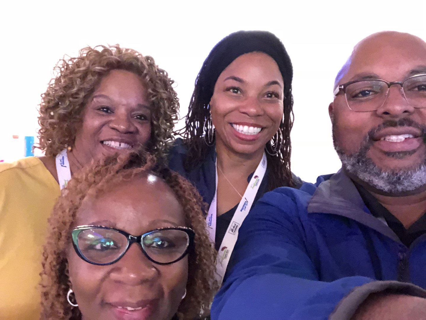 A group of people are posing for a picture together