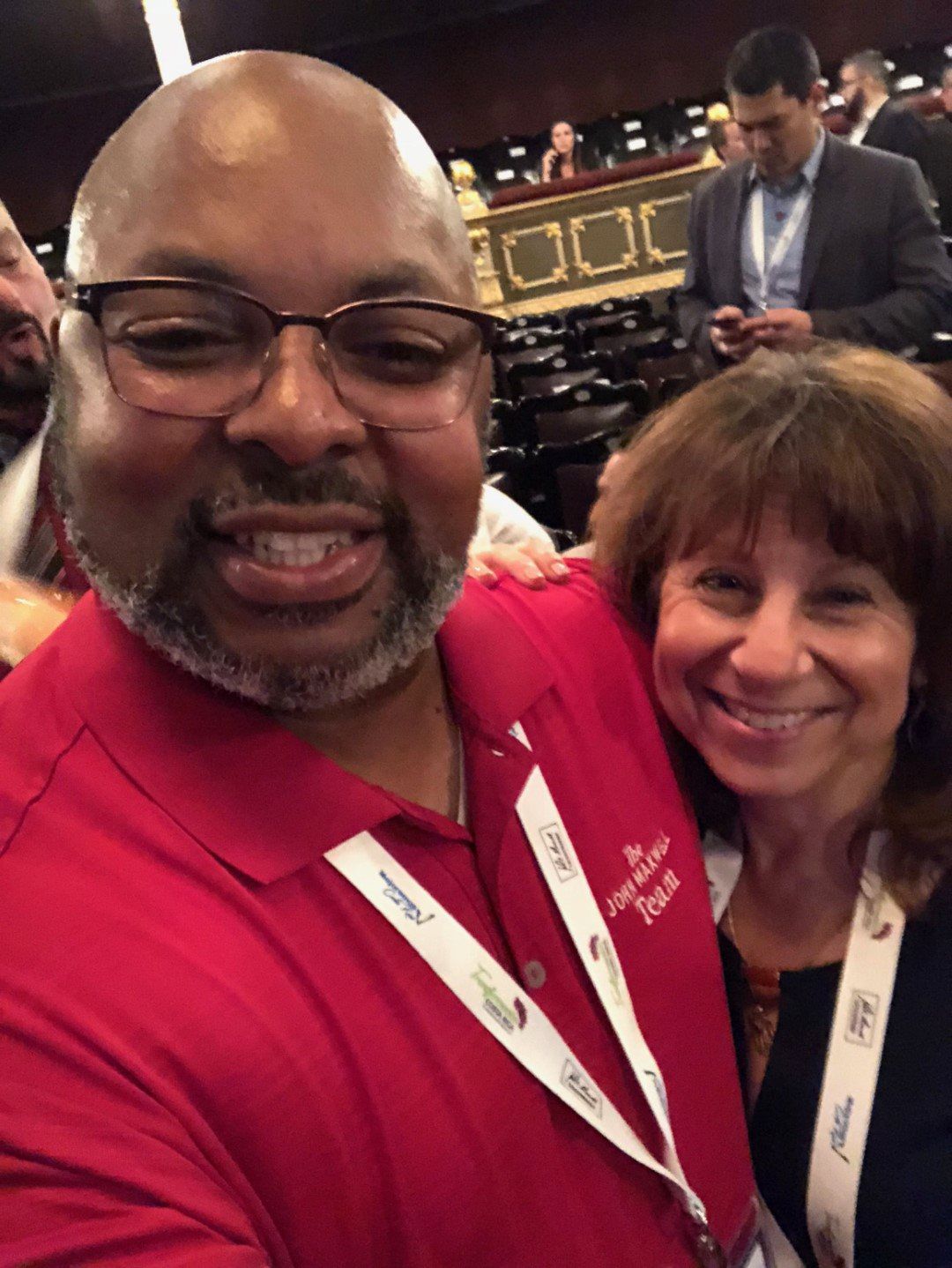 A man and a woman are posing for a picture together