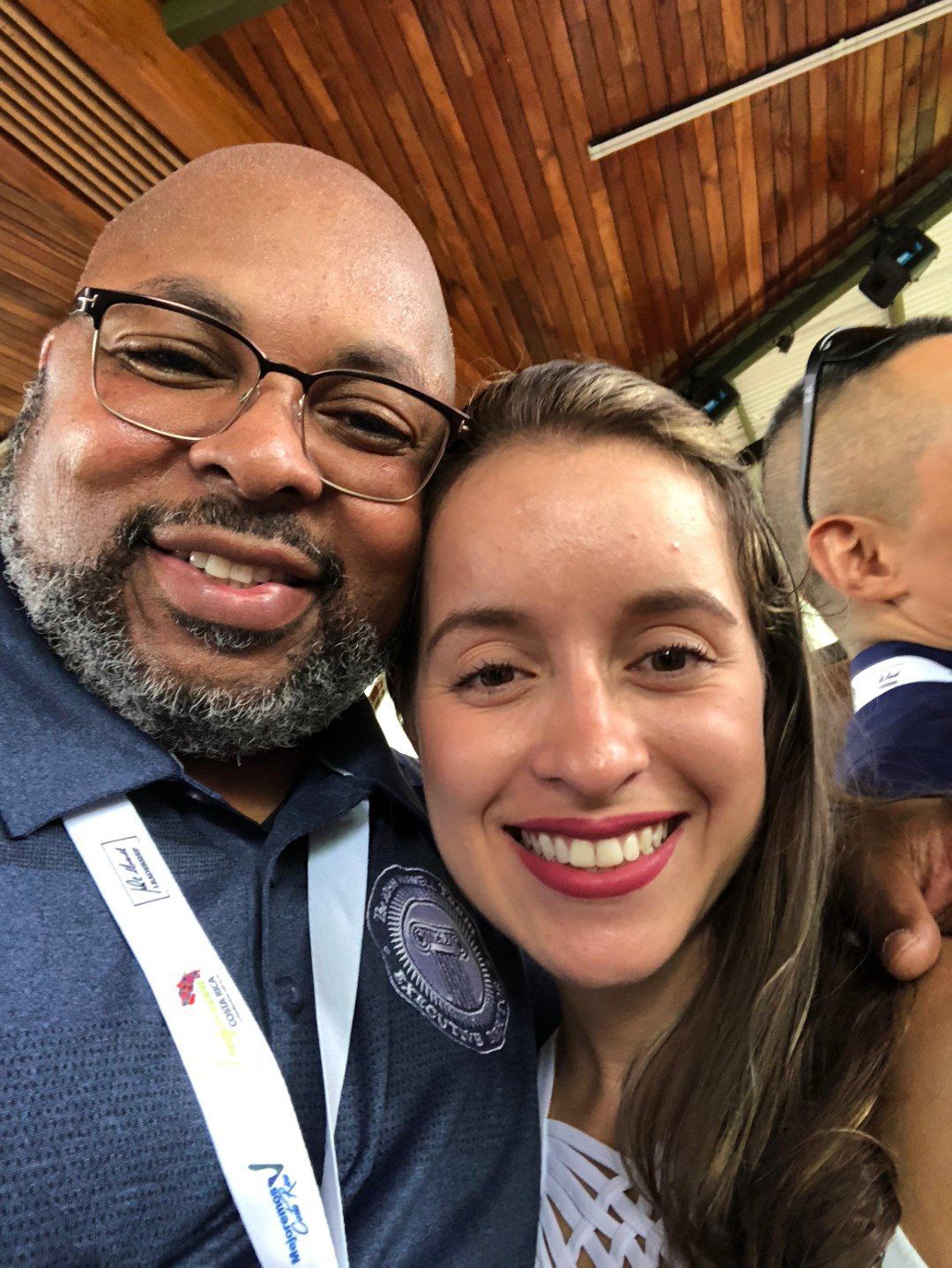 A man and a woman are posing for a picture together.