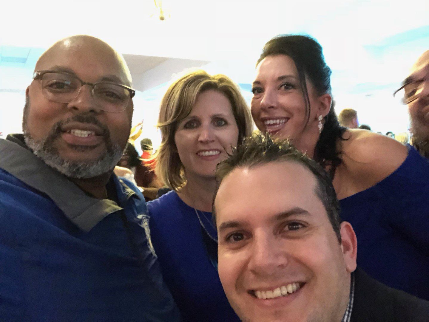 A group of people are posing for a picture together.