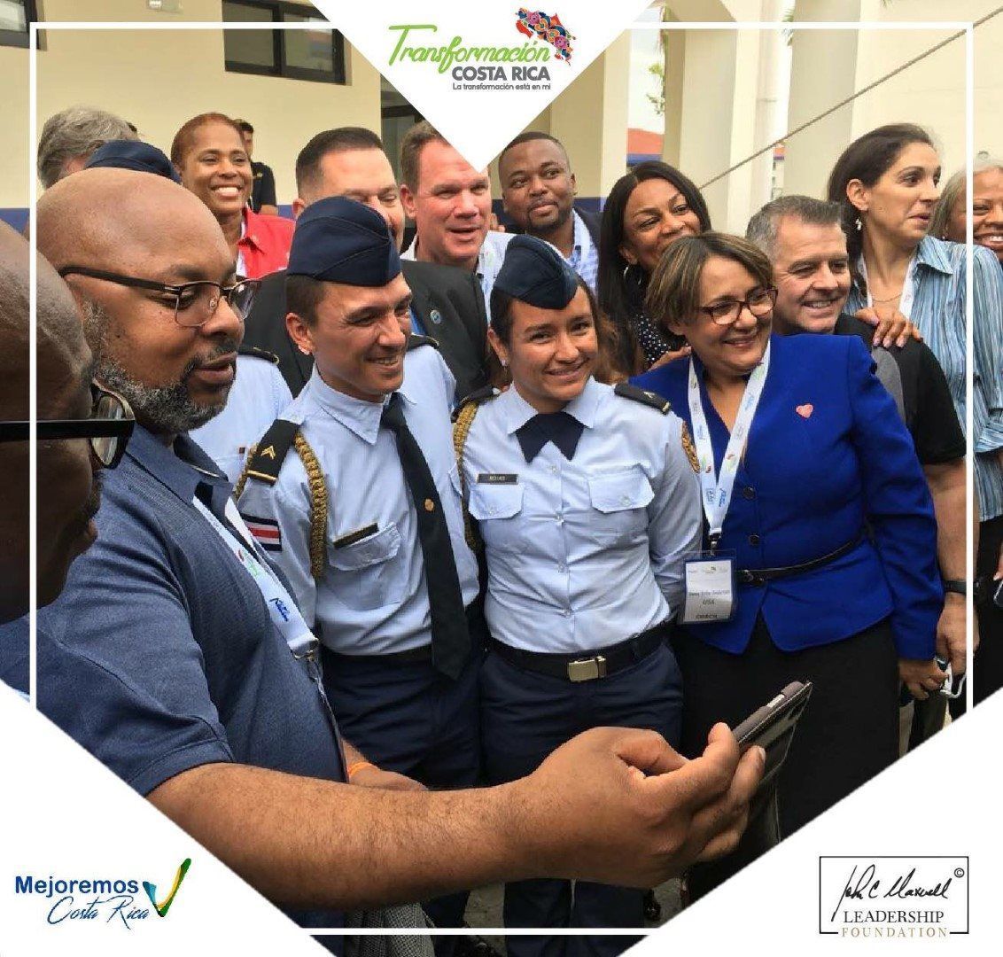 A man is taking a picture of a group of people