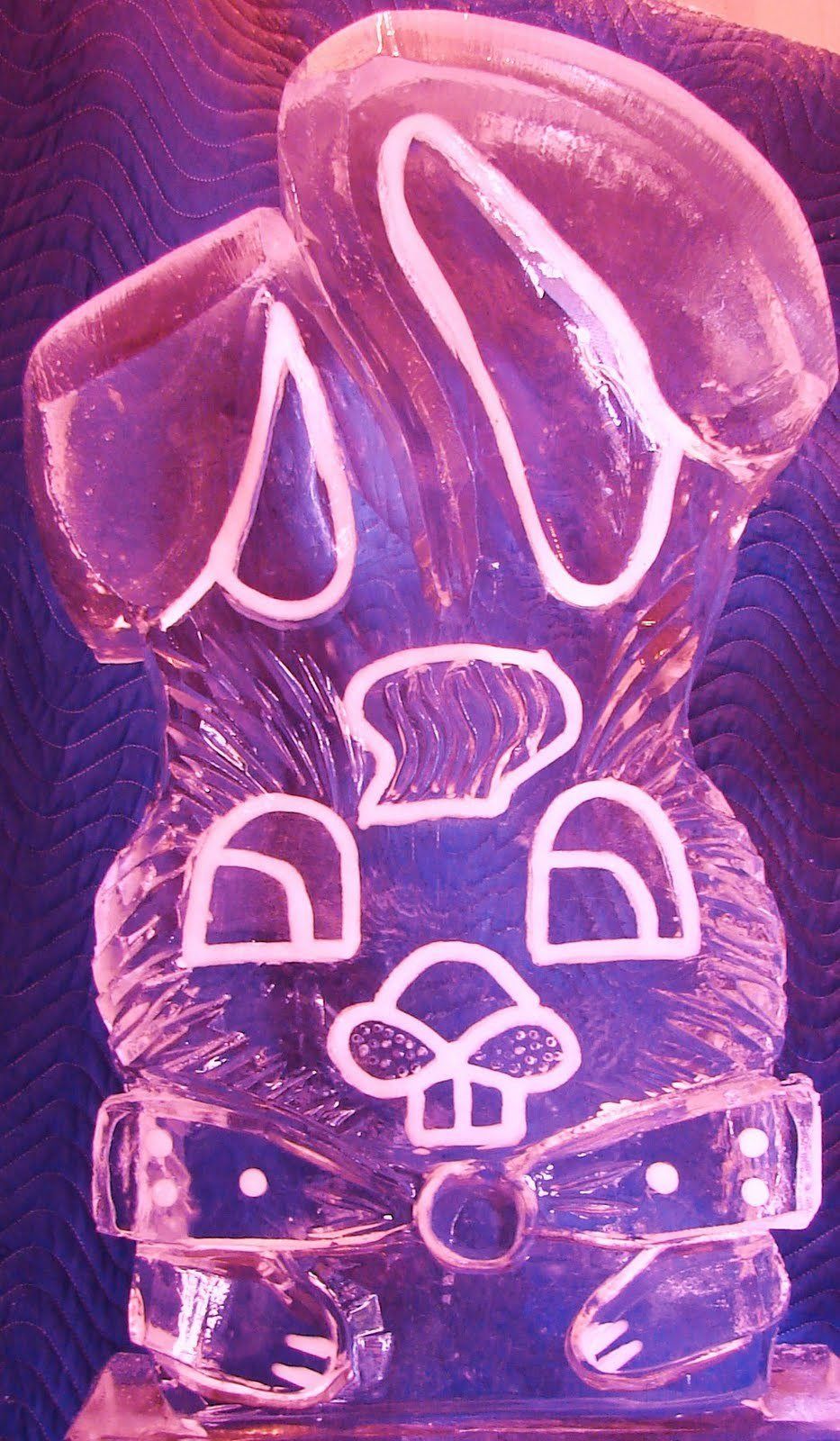 A close up of a purple ice sculpture of a dog