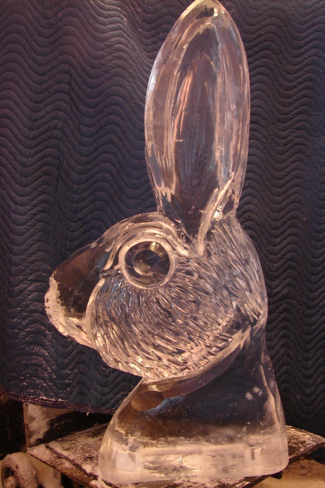 A statue of a rabbit with a large ear