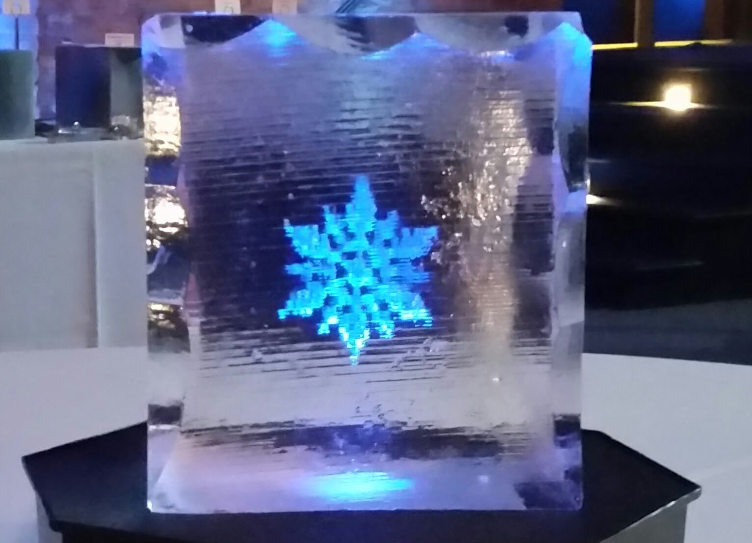 A block of ice with a snowflake on it