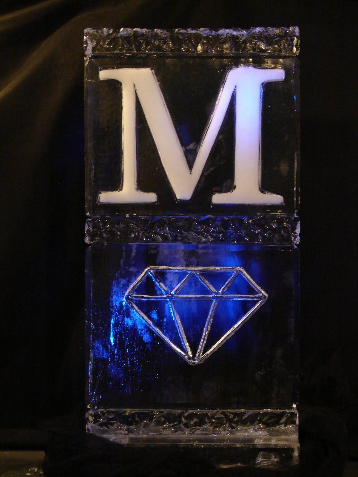 A block of ice with the letter m and a diamond
