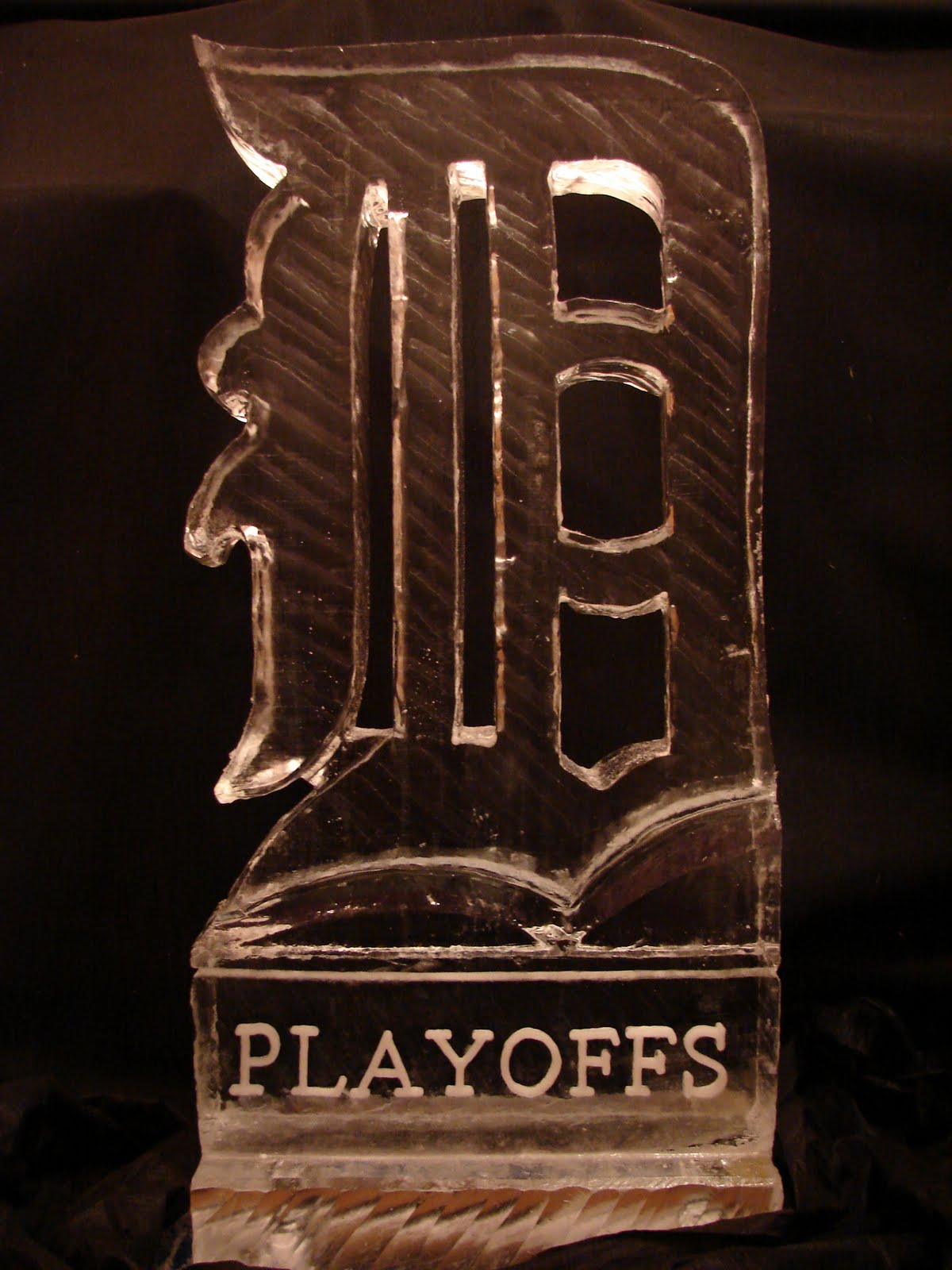 An ice sculpture with the word playoffs on it