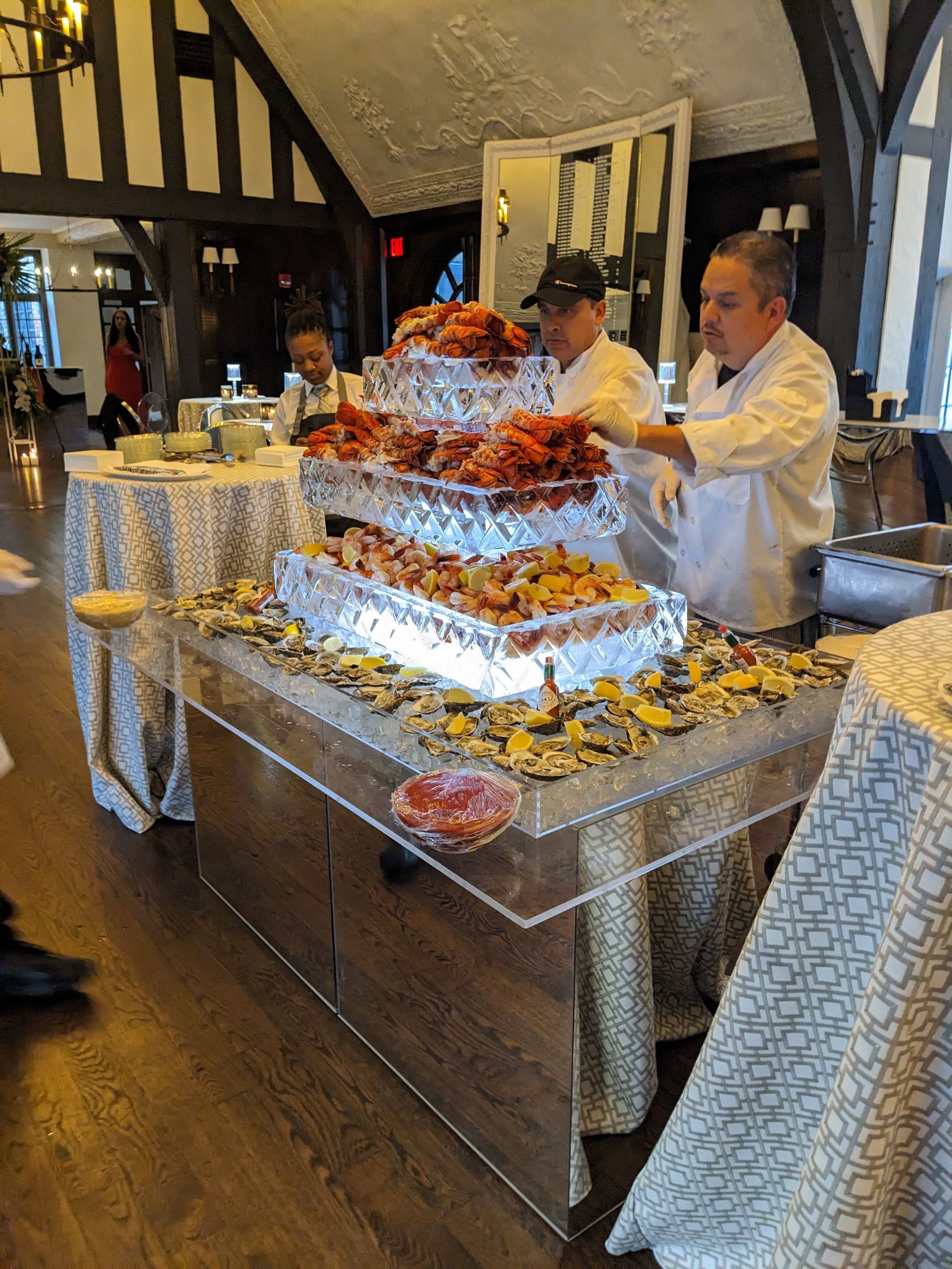 A buffet table with a lot of food on it in a restaurant.
