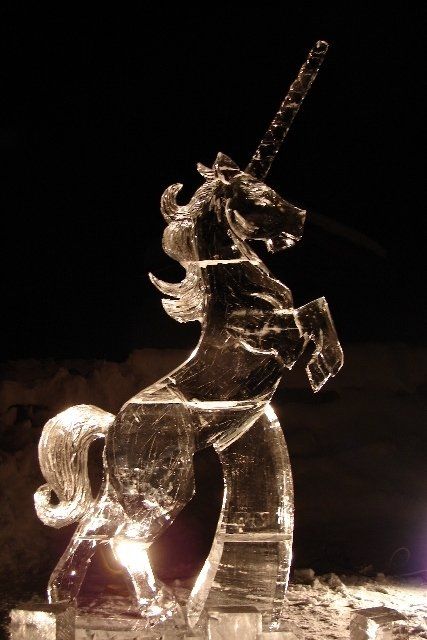 A statue of a unicorn made of ice