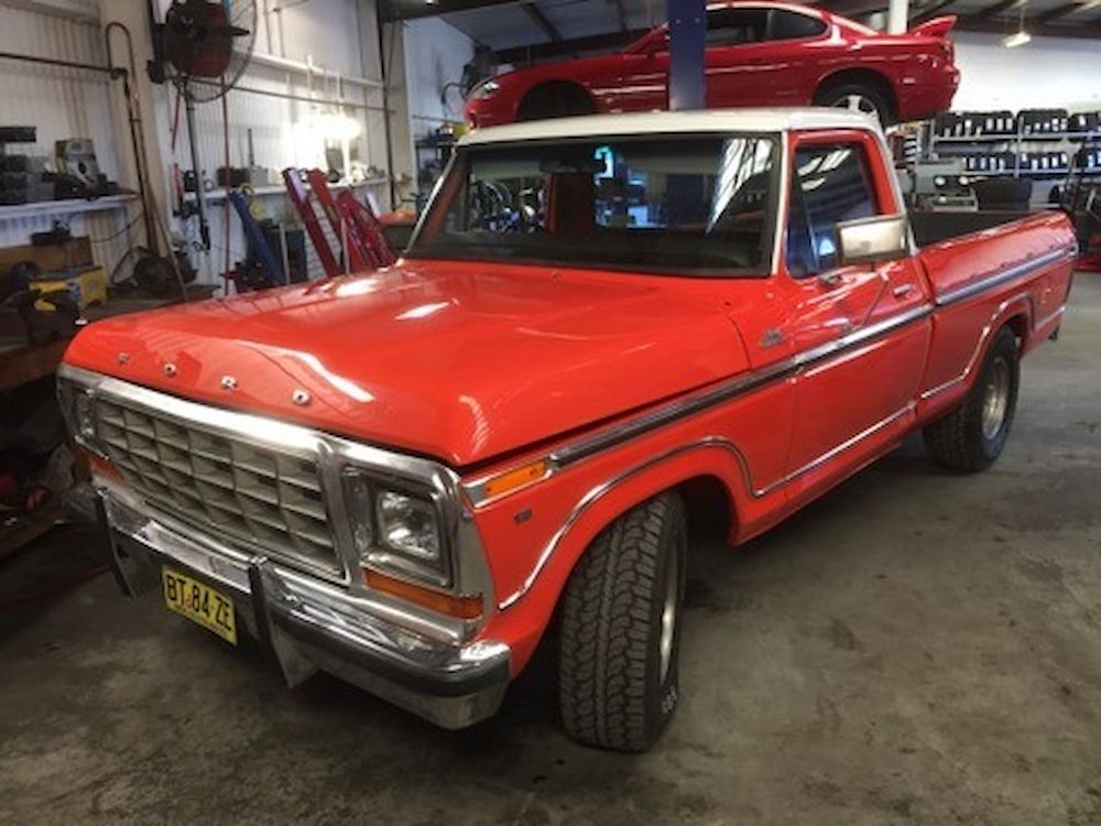 A Red Ford Truck Is Parked In A Garage — Sojos Mechanical & Tyre Service In West Gosford, NSW