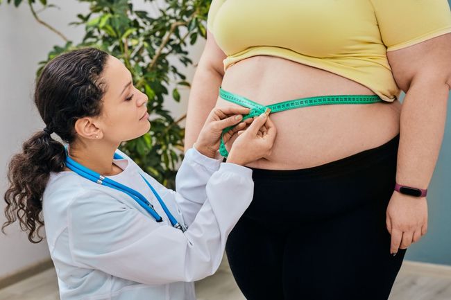 A Doctor Is Measuring A Woman 's Waist — Great Bends, KS — Innovative Wellness A Doctor Is Measuring A Woman 's Waist — Great Bends, KS — Innovative Wellness