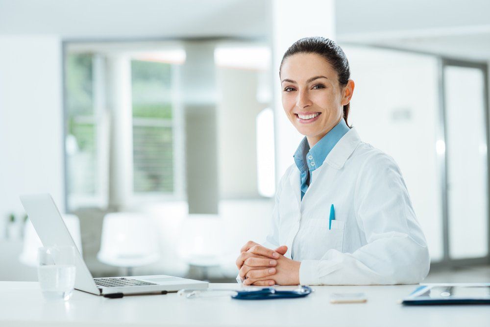 Female Doctor at Office Desk — Accredited Training in Rockhampton QLD